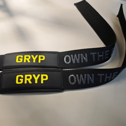Vista completa de los Lifting Straps GRYP sobre fondo neutro, destacando calidad y diseño ergonómico

